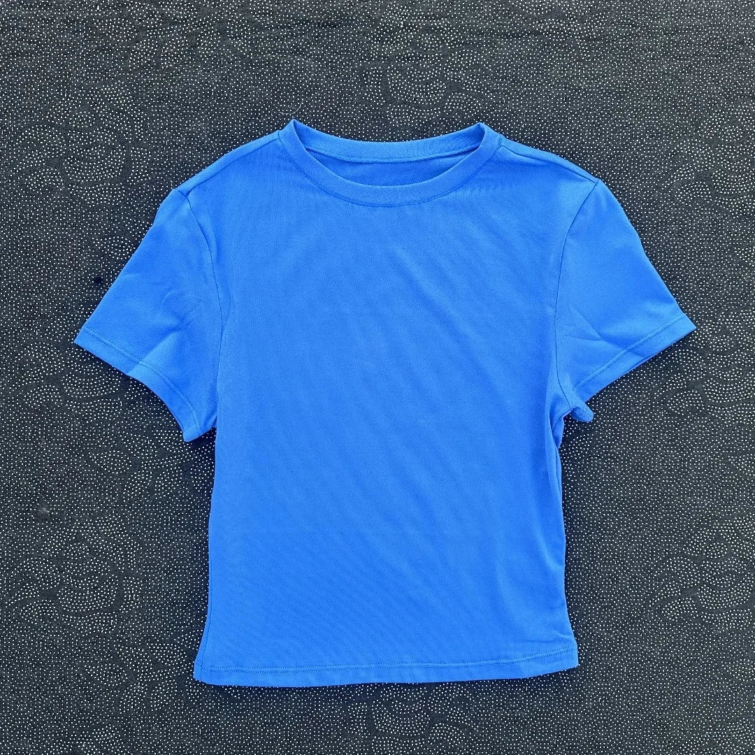 Solid color fitness women's soft breathable yoga short-sleeved comprehensive training tight T-shirt with exposed belly button