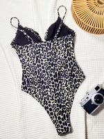 Sexy Black Leoard Print Patchwork One Piece Swimsuit 2026 Women Front Bow Hollow Out Bandage Cross Bathing Suit Holiday Swimwear