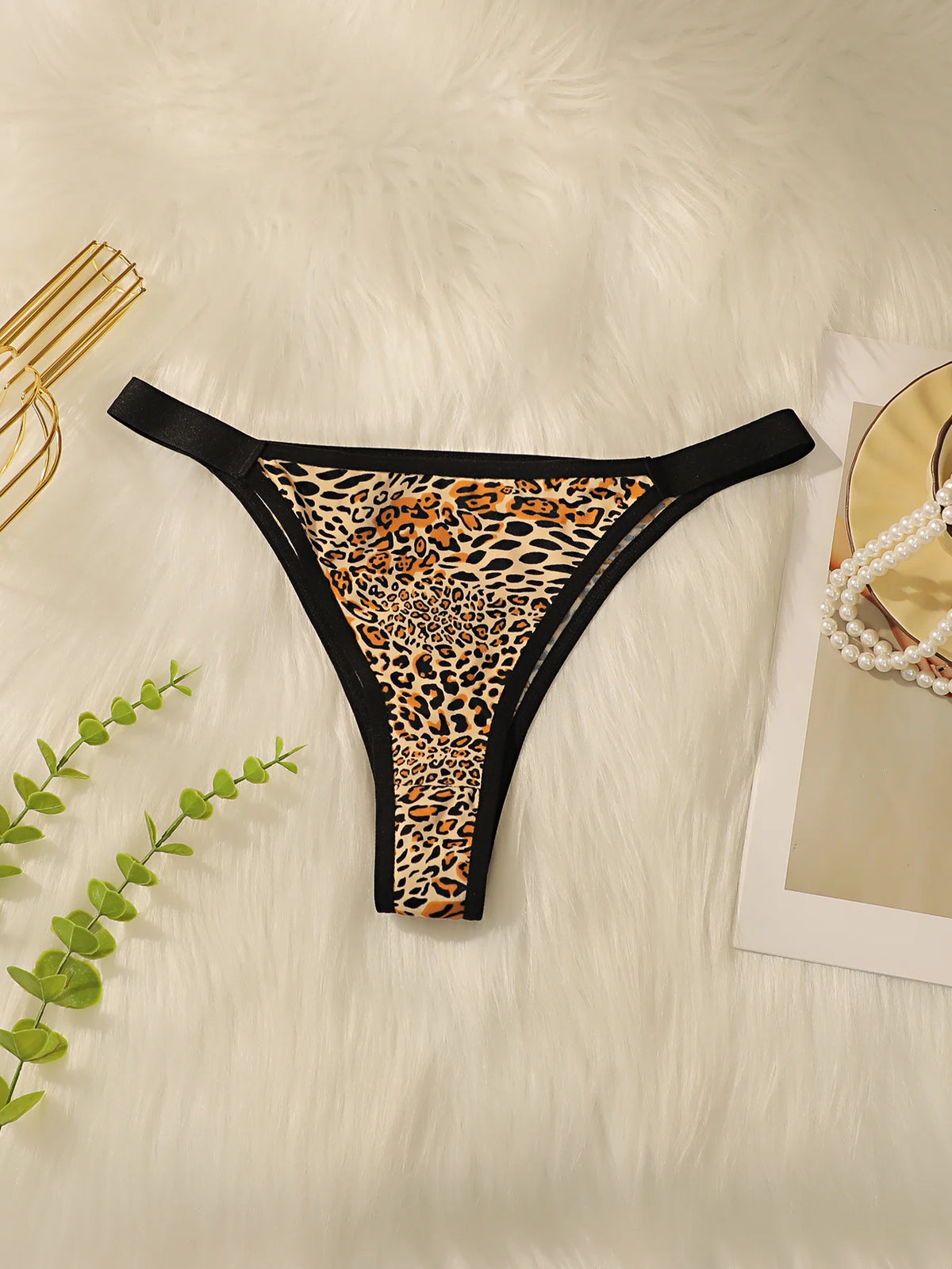 Women's sexy leopard print underwear with low waist and seamless hollow out easy to wash and dry close fitting underwear C2385