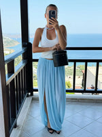 FDYOUI Elegant Solid Color Pleated Skirts for Women 2026 Chic High Slit Long Skirt High Street Office Lady Vacation Party Dress
