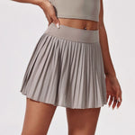 Elastic High Waist Slimming Tennis Skort Women Summer Running Fitness Skirt with A Light Strip Lining and Pockets Pleated Skirts