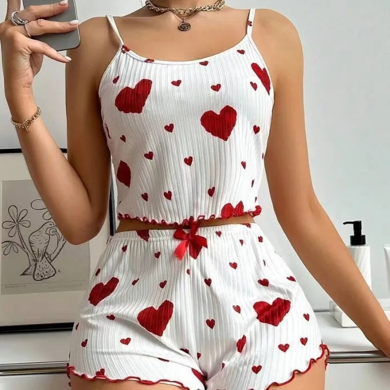 Heart Print Ribbed Frill Trim Pajama Set, Cute Bow Notched Neck Cross Strappy Backless Crop Cami Top & Elastic Shorts, Women's