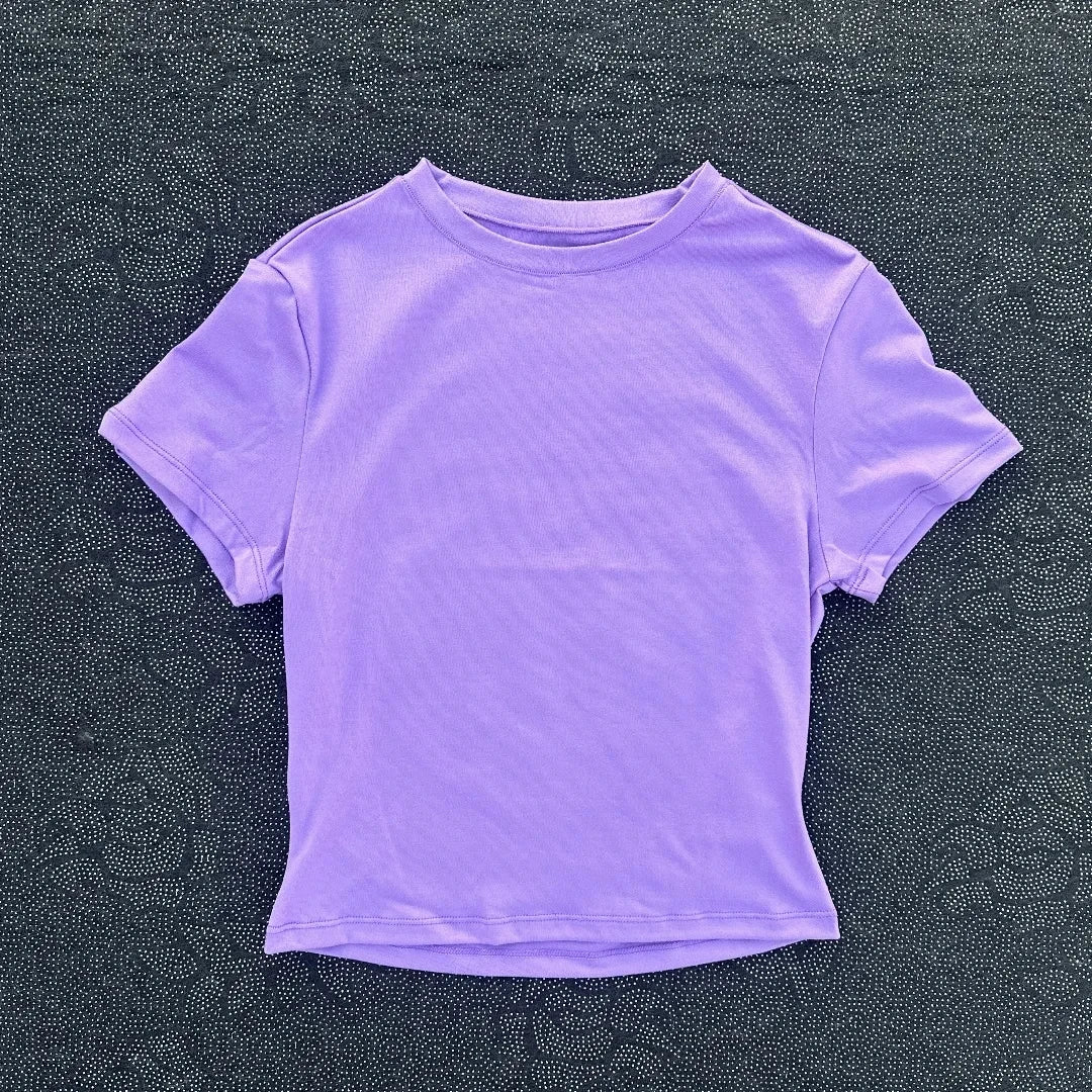 Solid color fitness women's soft breathable yoga short-sleeved comprehensive training tight T-shirt with exposed belly button