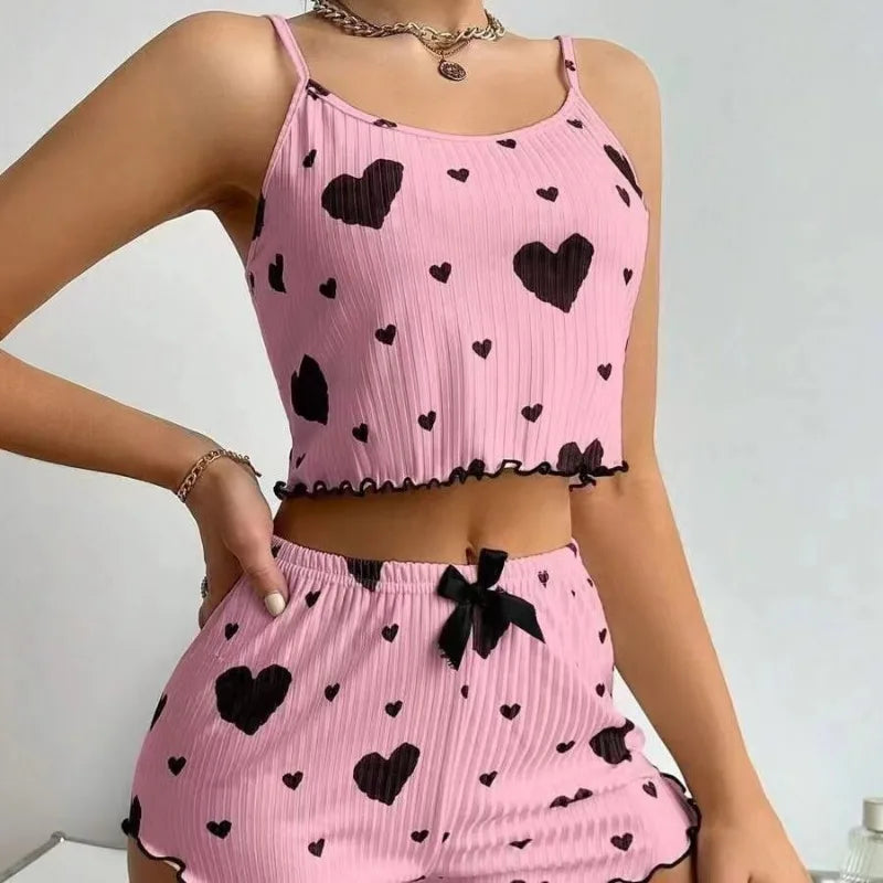 Heart Print Ribbed Frill Trim Pajama Set, Cute Bow Notched Neck Cross Strappy Backless Crop Cami Top & Elastic Shorts, Women's