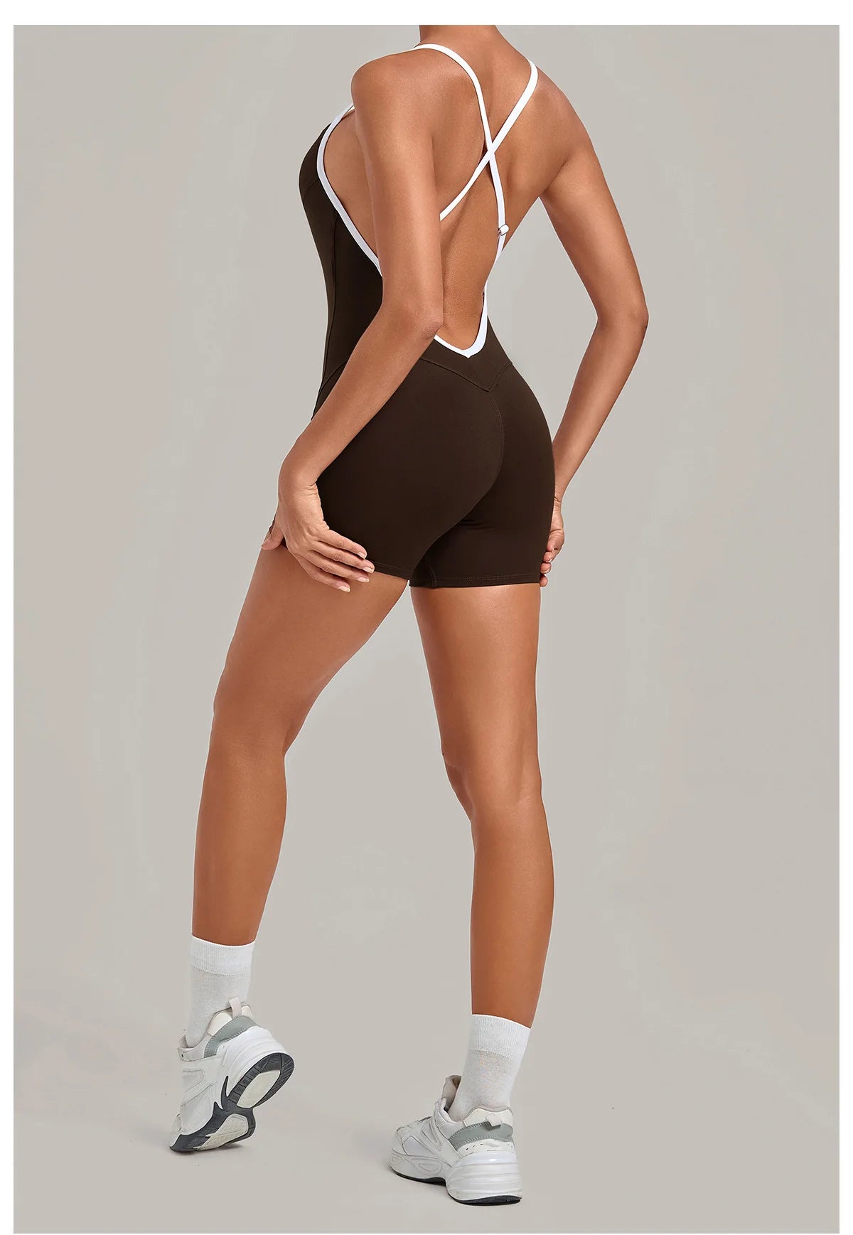 New Tight One-piece Yoga Suit Women Color Contrast Splicing Hollow Back Cross Sports Jumpsuit Outwear Slimming Fitness Bodysuits