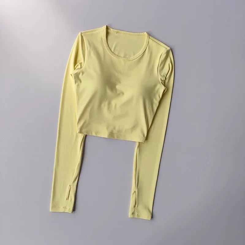 Women's long sleeved yoga suit sports top, high-end tight fitting hollow back fixed chest cushion