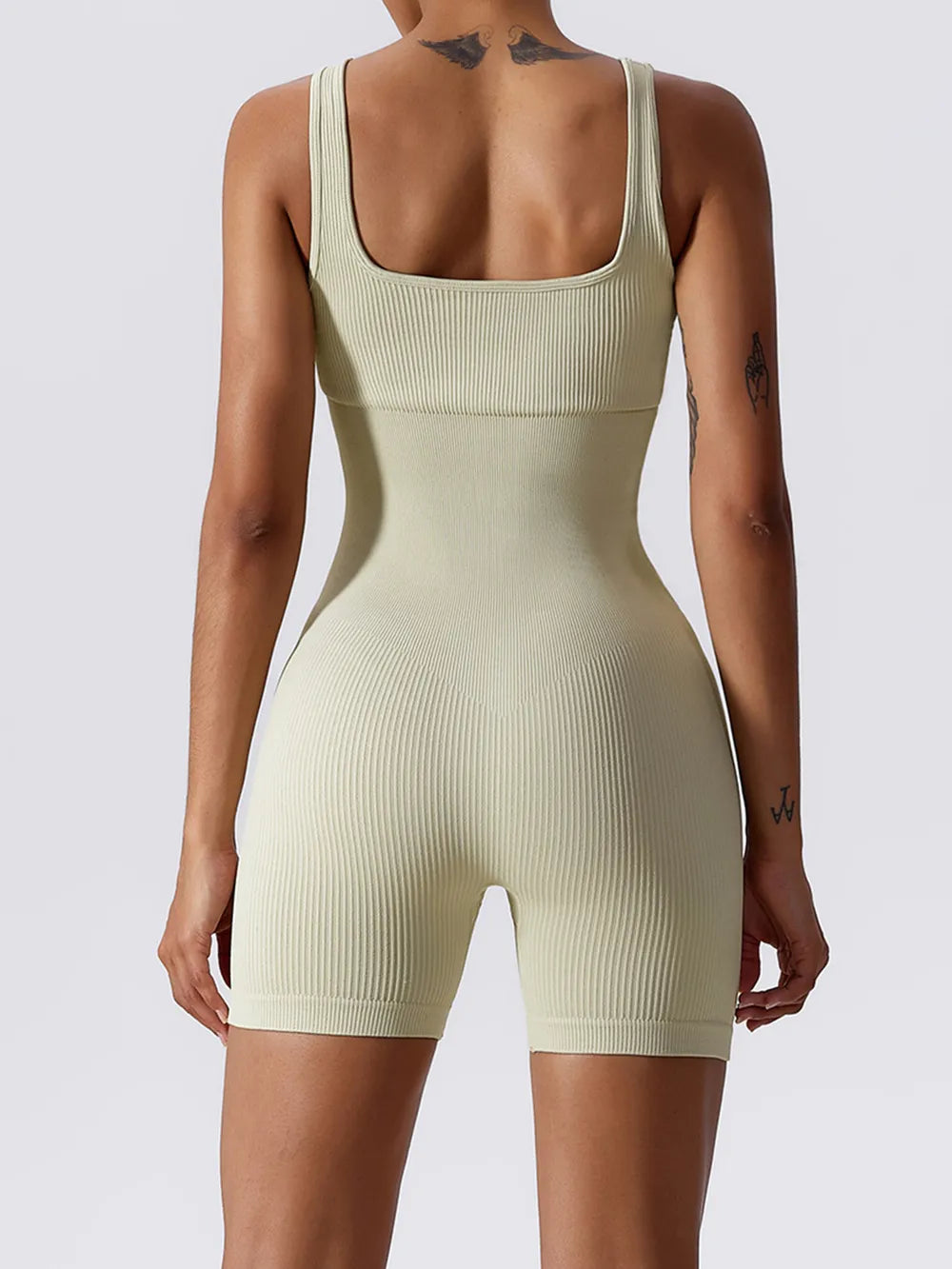 Basic Bae Ribbed Sleeveless Active Romper - Ladyez