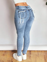 Distressed Skinny Jeans with Bow Back - Ladyez