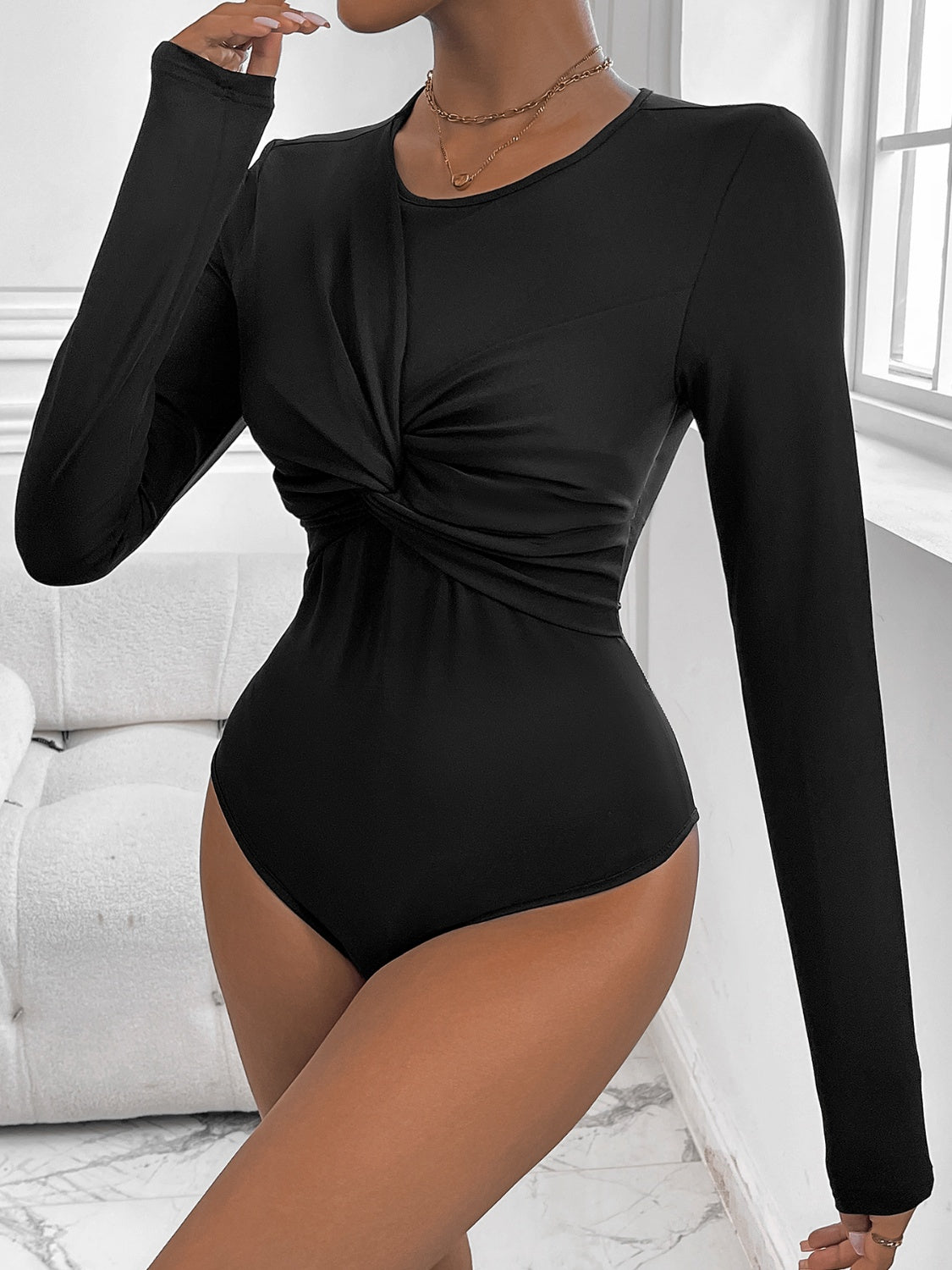 Perfee Twisted Round Neck Long Sleeve Bodysuit - Ladyez