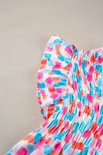 Ruffled Printed Notched Cap Sleeve Blouse