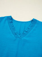 Textured Frill Smocked V-Neck Blouse