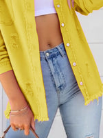 Distressed Denim Jacket with Frayed Edges