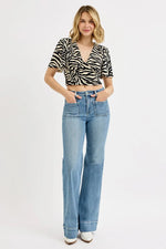 RISEN Full Size High Rise Wide Flare Patch Pocket Jeans Plus Size - Ladyez