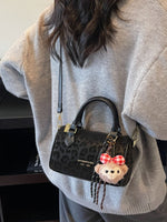 Leopard Print Barrel Crossbody Bag