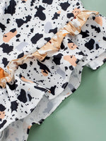 Ruffled Printed Mock Neck Cap Sleeve Blouse