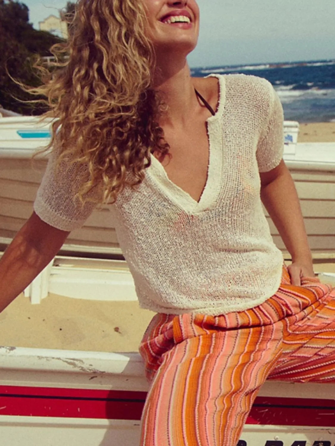 Notched Short Sleeve Knit Top