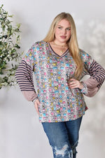 Celeste Full Size Animal Print Striped Long Sleeve Top - Ladyez