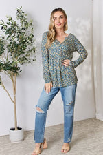 Heimish Full Size Floral Half Button Long Sleeve Blouse - Ladyez