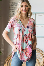 Heimish Full Size Floral V-Neck Short Sleeve Babydoll Blouse - Ladyez