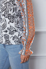 Tassel Tie Neck Printed Smocked Long Sleeve Blouse - Ladyez