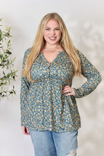 Heimish Full Size Floral Half Button Long Sleeve Blouse - Ladyez