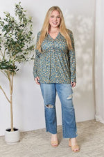 Heimish Full Size Floral Half Button Long Sleeve Blouse - Ladyez