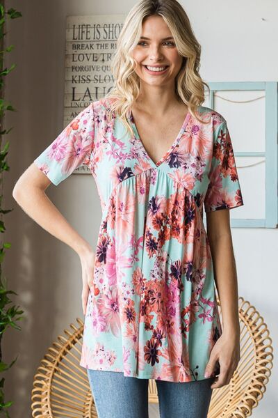 Heimish Full Size Floral V-Neck Short Sleeve Babydoll Blouse - Ladyez