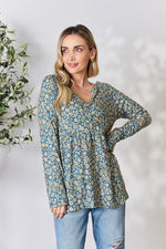 Heimish Full Size Floral Half Button Long Sleeve Blouse - Ladyez
