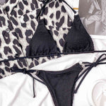 Textured Halter Neck Tie Side Bikini Set - Ladyez