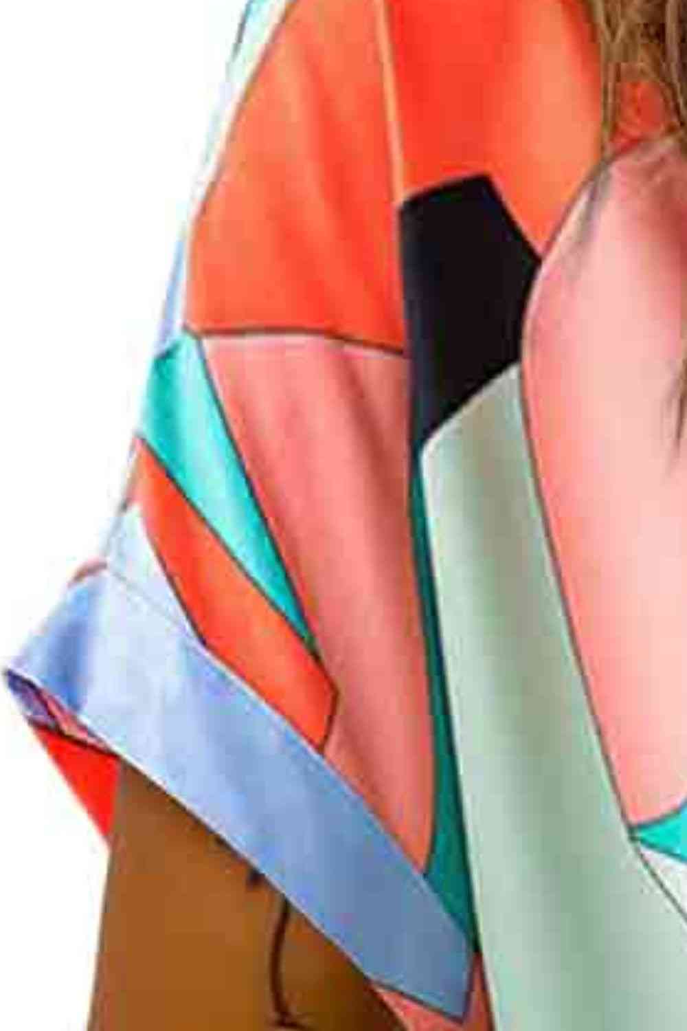 Printed V-Neck Short Sleeve Blouse - Ladyez