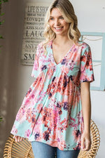 Heimish Full Size Floral V-Neck Short Sleeve Babydoll Blouse - Ladyez